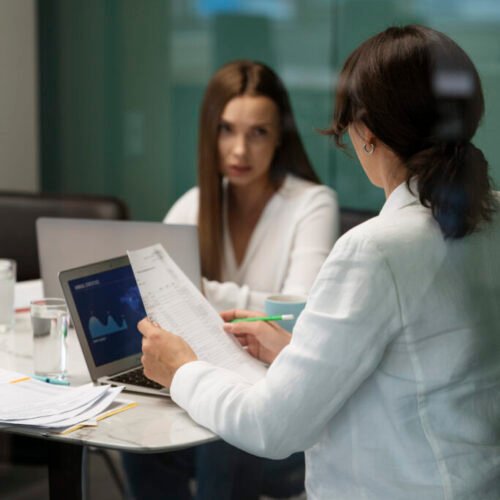 side-view-women-working-together